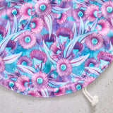 Floral-patterned reusable bowl cover on a light grey background