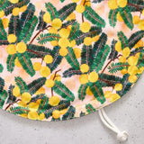 Floral-patterned reusable bowl cover on a light grey background
