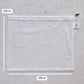 Mesh reusable produce bag with measurements on a grey surface