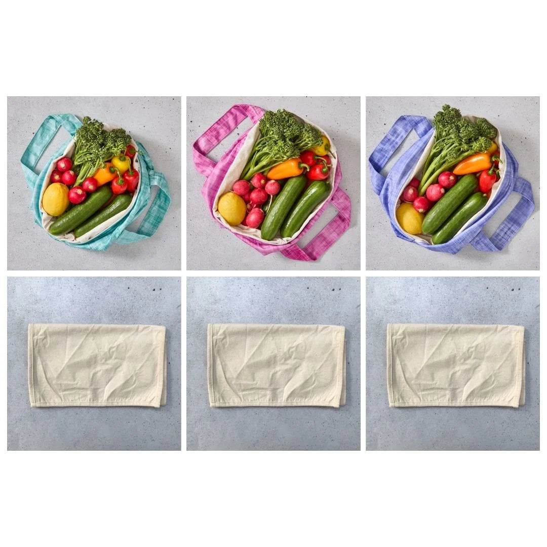 Reusable produce bags filled with vegetables on a grey background